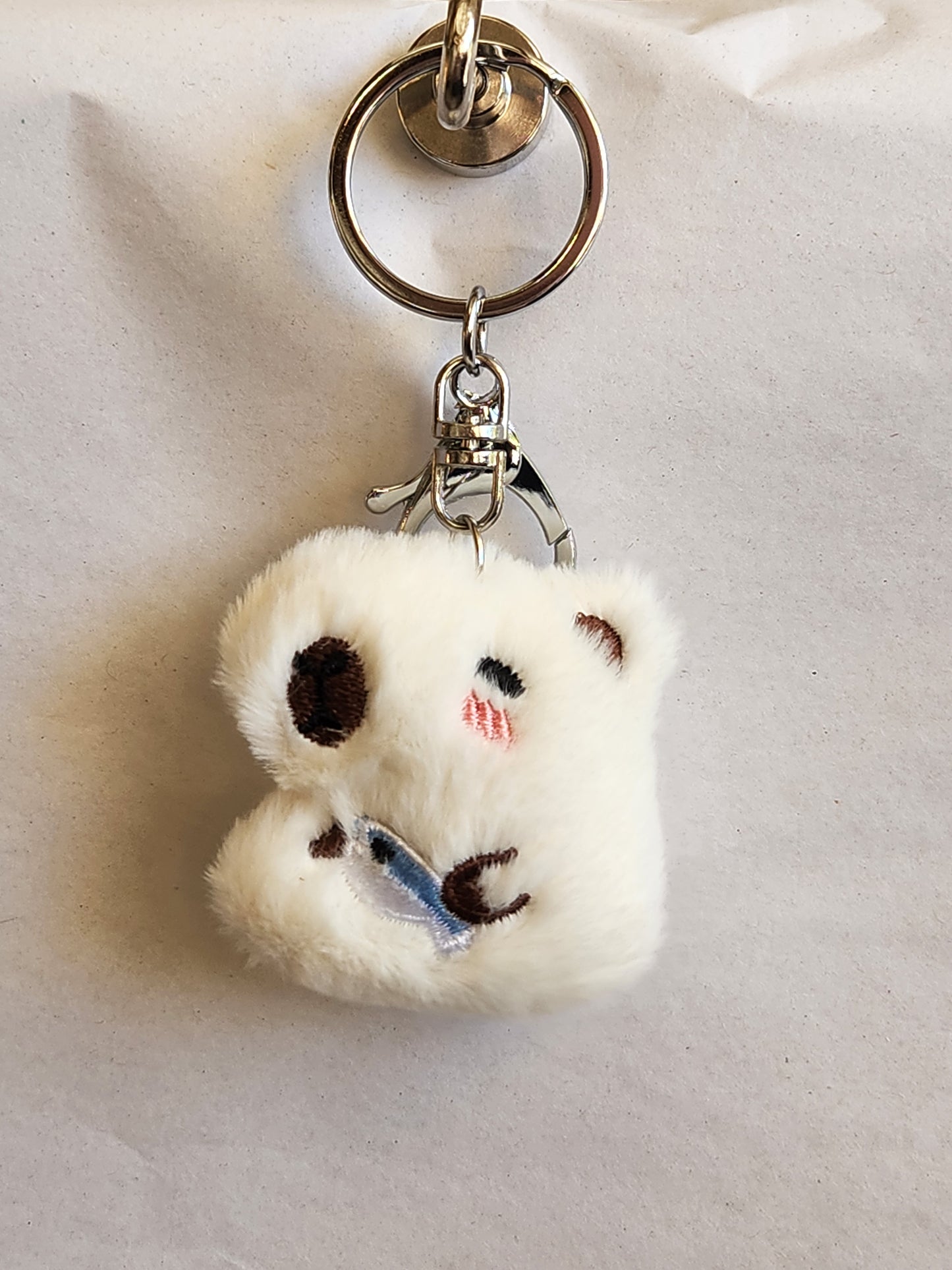 Capybara Holding A Fish Keychain