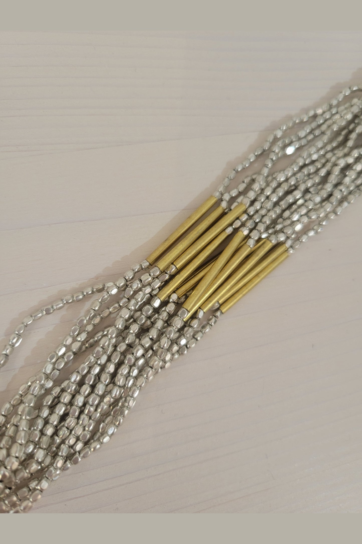 Anjuna Bracelet -Silver beads golden tube
