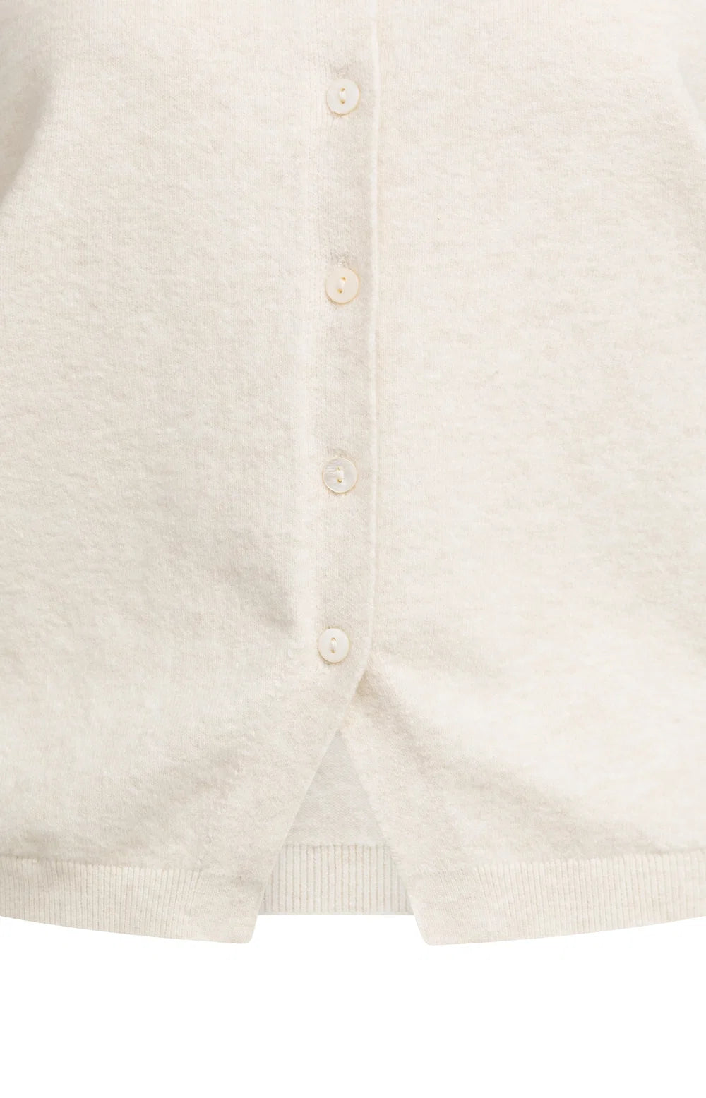 Knitted spencer with button closure