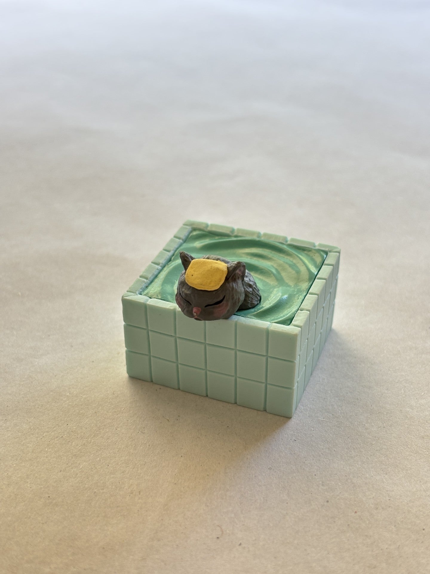 Bathing Cat Figurine