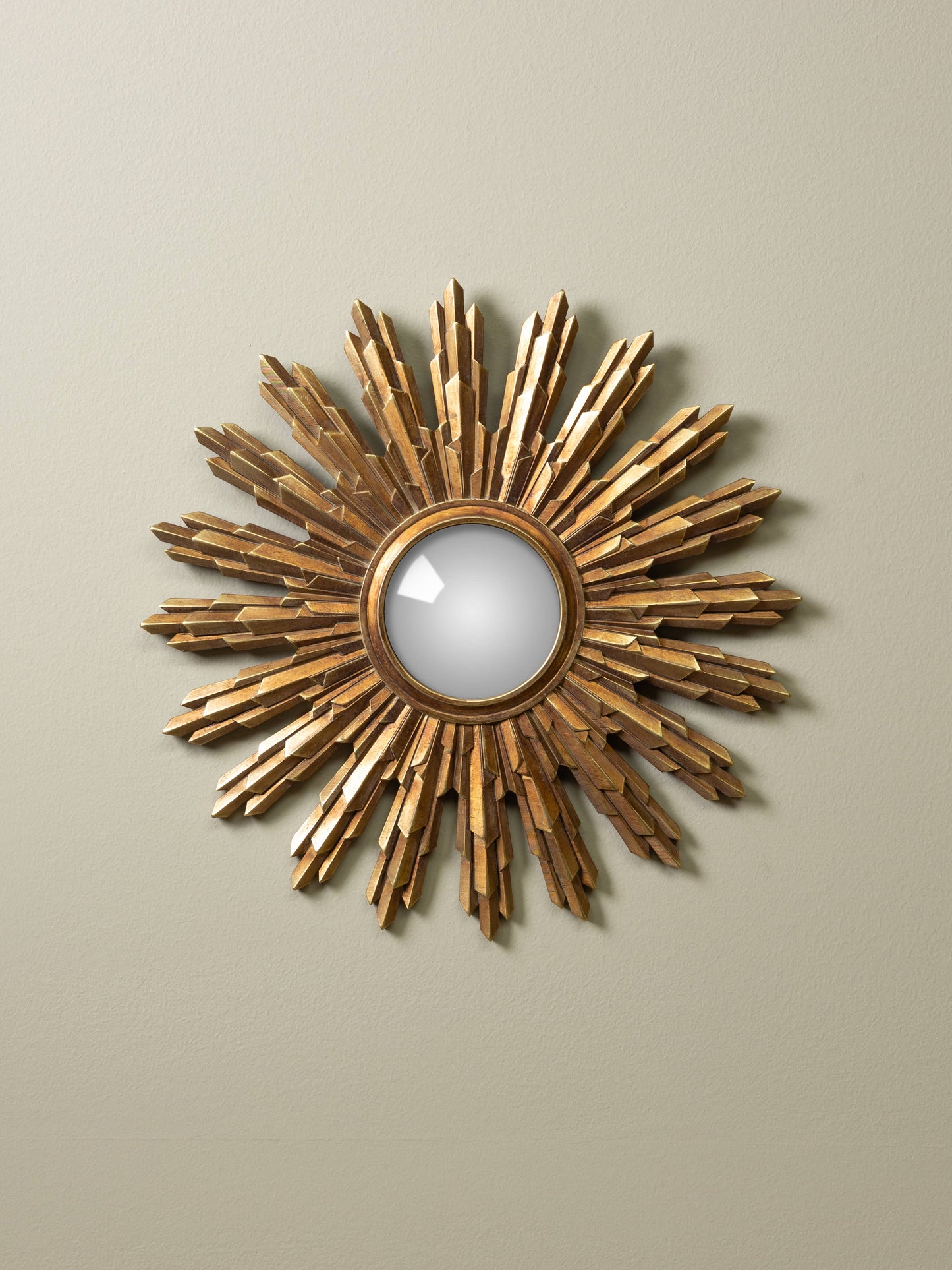 Convex golden mirror covent