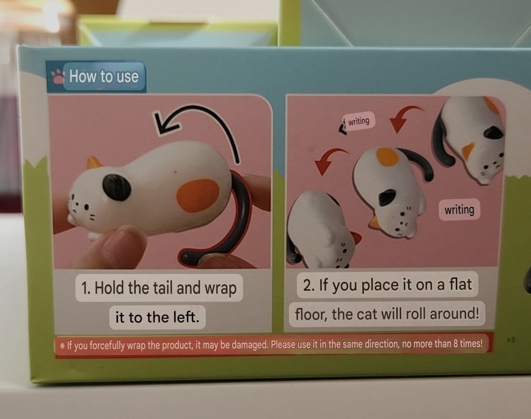 Small Rolling Cat Figure
