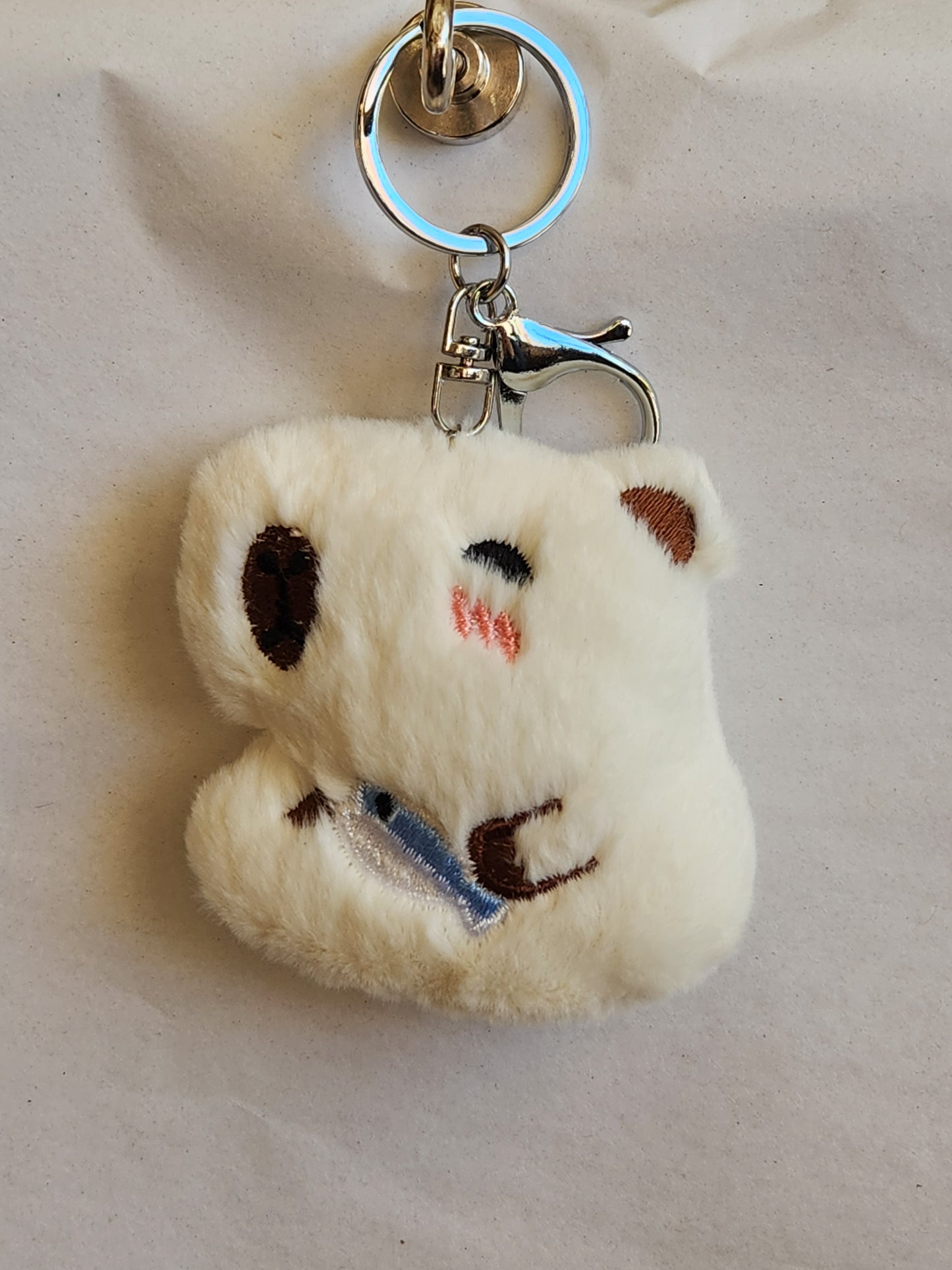 Capybara Holding A Fish Keychain