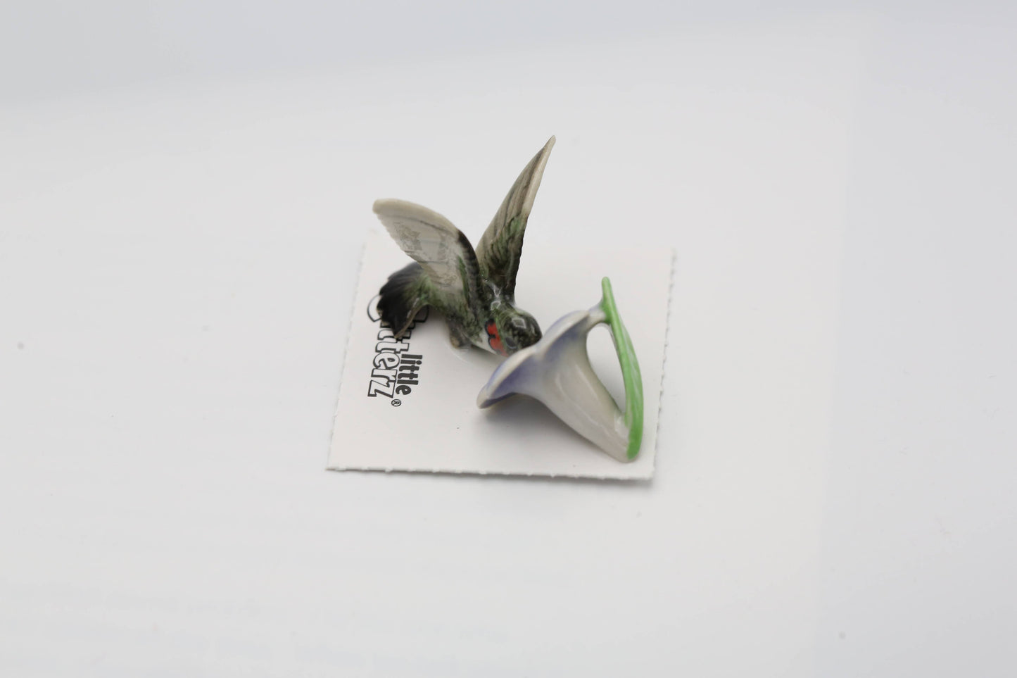 Ruby Hummingbird on Flower Porcelain Miniature