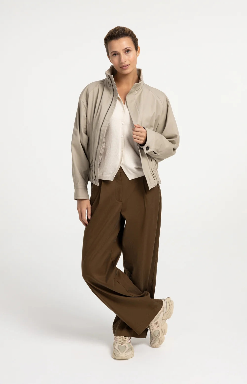 Knitted spencer with button closure