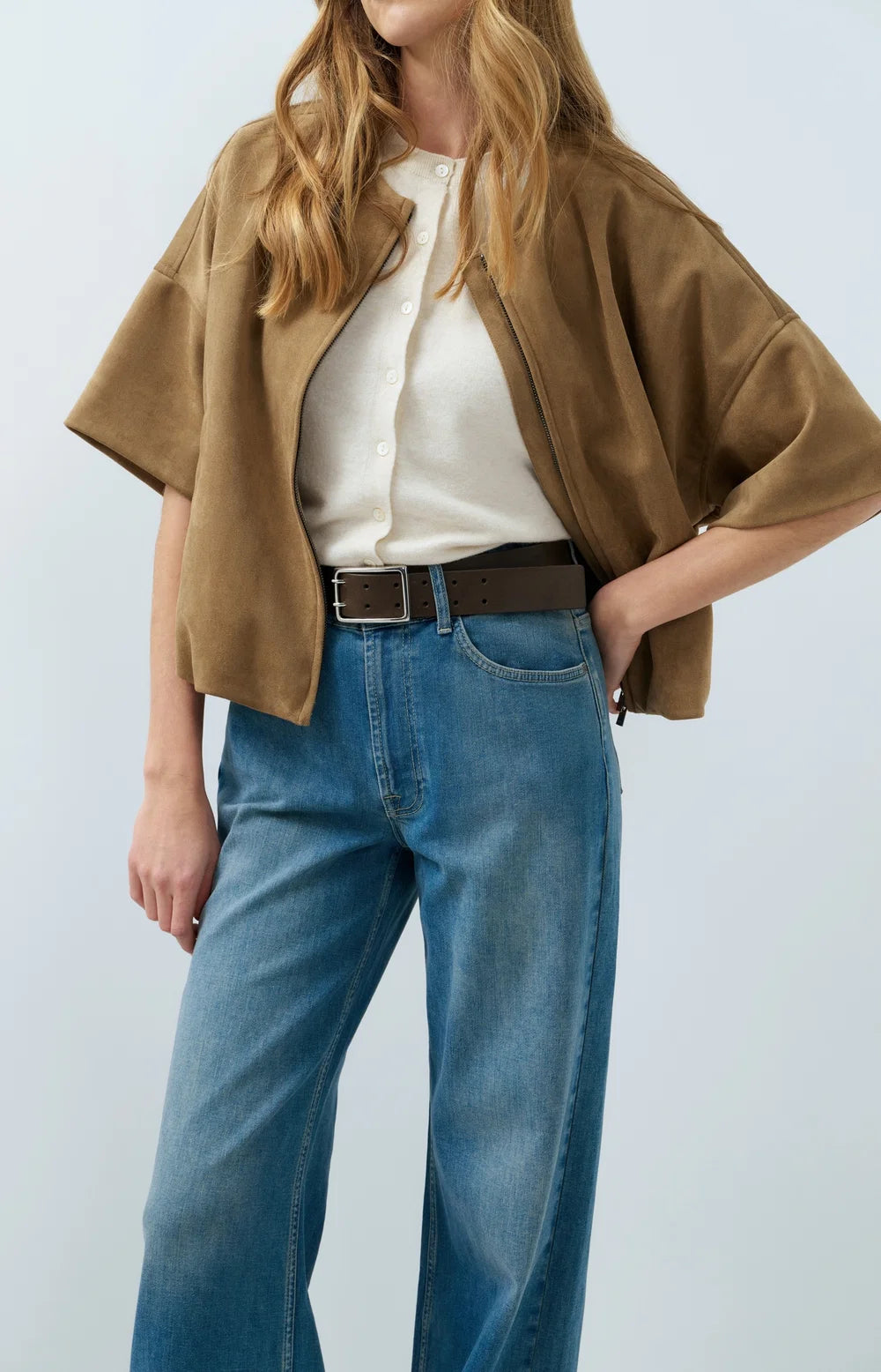 Knitted spencer with button closure