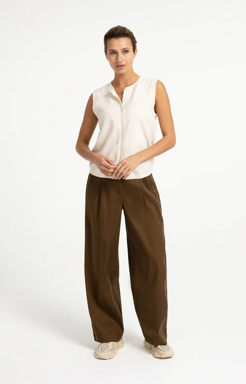 Knitted spencer with button closure