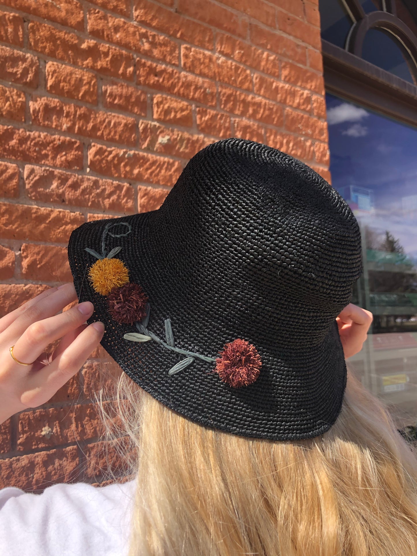 Straw Hat with Pom Pom Flowers